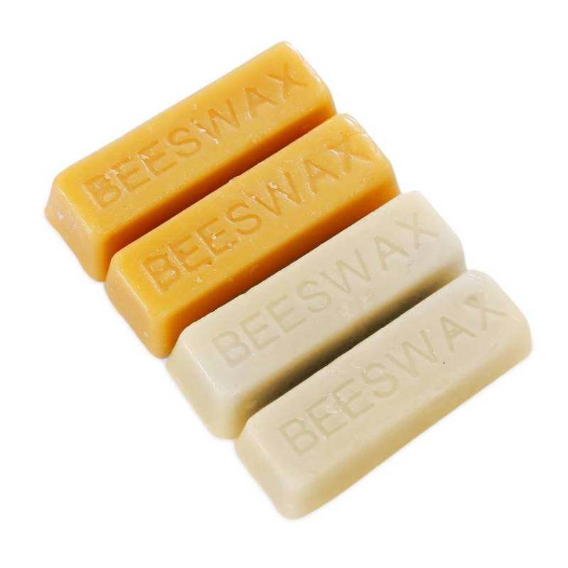 Natural beeswax in ingots, natural and filtered white.